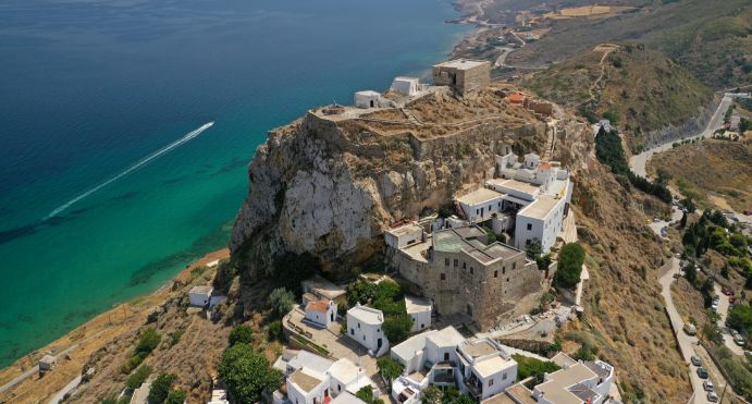 The Byzantine castle above the whitewashed town of Chora at golden hour